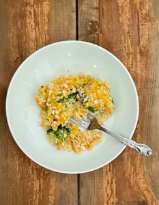 over head photo of vegetarian slow cooker cheesy broccoli casserole